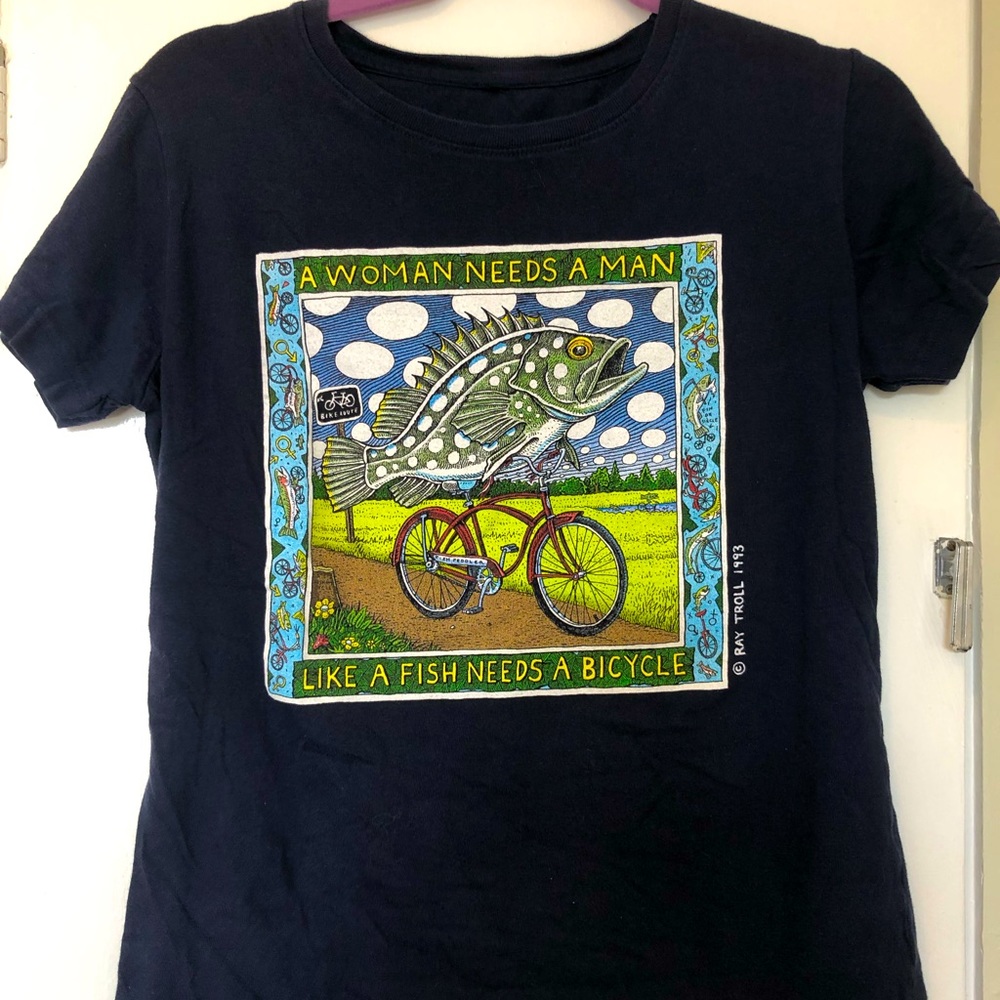 Ray Troll Women’s T-Shirt- A Woman Needs a Man Like a Fish Needs a Bicycle